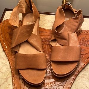 Ankle strap and zip leather sandals